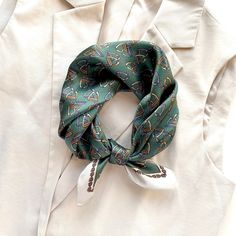 The green silk scarf is the perfect accessory, and as it can be used all year round, it is an essential addition to any wardrobe, It's soft, light and breathable enough to wear in all kinds of weather, making it a versatile and reliable piece for any look. Silk is also a sustainable and biodegradable material, making it a conscious choice for those who prioritise eco-friendly fashion. Please note that as with all natural fabrics, slight variations may occur, adding to the scarf's unique charm. T Silk Headwrap, Headband Scarf, Green Silk Scarf, Silk Bandana, Silk Headband, Scarf Silk, Scarf Headband, Eco Friendly Fashion, Neck Scarf