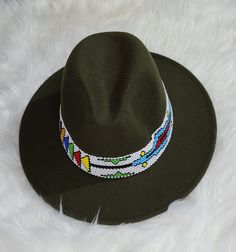 Handmade Multicolor Flat Brim Fedora, Handmade Multicolor Fedora With Curved Brim, Red Beaded Festival Hat, Multicolor Beaded Hat With Curved Brim, Green Brimmed Felt Hat For Festival, Green Wide Brim Felt Hat For Festival, Handmade Multicolor Brimmed Fedora, Handmade Adjustable Fedora As A Gift, Adjustable Green Bohemian Felt Hat