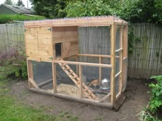 a small chicken coop in the backyard