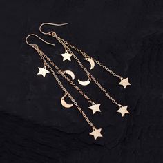 "Shooting Star Cascade Earrings, Rose Gold Celestial Jewelry, Moon and Star Earrings, Silver Crescent Moon, Constellation Dangle Gift for Her These lightweight celestial earrings feature two chain cascades with stars and crescent moons. Available in Gold, Silver, Rose Gold and Black Oxidized Silver! M A T E R I A L S ∙ A N D ∙ S I Z E * SIZE: -Length: approx. 3.25\" * METAL: - Ear Wire is 14K gold filled / sterling silver / 14k rose gold filled / black oxidized silver - Charm Chain is gold verme Moon Constellation, Celestial Earring, Star Earrings Silver, Cascade Earrings, Constellation Earrings, Half Moon Earrings, Long Chain Earrings, Moon And Star Earrings