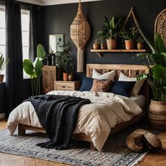 a bedroom with plants on the wall, bed and rugs in front of it