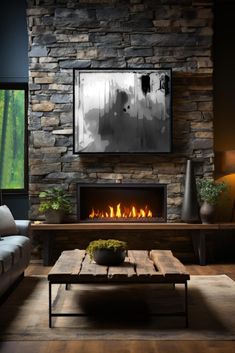 a living room with a fire place and couches in front of a stone wall