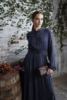 Step into elegance with the Navy Lylah Dress from Mun's AW24-25 collection. Inspired by rich vineyard tones and crafted with luxurious fabrics, this dress combines comfort with timeless charm. Perfect for those looking to dress to impress this fall, whether in business casual settings or a night out. Get ready to elevate your wardrobe this season! #DressToImpress #AutumnFits #WomensFashion #BusinessCasual #FallFashion2024Women #FallOutfits2024 #FallOutfitsWomen #FallFashion 🍂👗 Chic A-line Dress With Fitted Waist, Chic A-line Pleated Dress, Silk Shirt Dress For Fall Daywear, Silk Shirt Dress For Daywear In Fall, Fall Silk Shirt Dress For Daywear, Fitted Viscose A-line Midi Dress, Chic A-line Dress With Pleated Waist, Chic A-line Maxi Dress For Daywear, Feminine Daywear Maxi Dress In Viscose