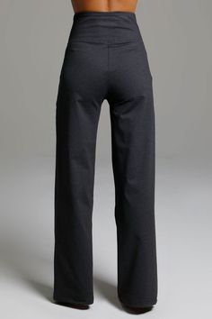 Why we love this: Discover timeless elegance in our High Waist Wide Leg Pant. These classic grey pants are the perfect blend of chic and comfort with a super-flattering waist, roomy pockets, & an elegant wide-leg design. Elevate your work wardrobe with our impeccably tailored pants. Features: KiraGrace PowerStrong Print: Feels comfortable and luxurious High-rise, 32.5" inseam. Leg Opening: 23" Slimming high waist with practical side pockets Need a different length? Now available in Tall & Petite Waist: High-Waisted (13.5" Rise) Inseam: Regular 32.5", Petite 30.5", Tall 34" For easy alterations - click here Leg Shape: Wide leg Sizing: True to size Compression: Flowy- No compression Model, Kori, is 5'10" 135 lbs., wearing a size small Clothes Websites, Career Lifestyle, Gem Gem, Yoga Bottoms, Yoga Dress, High Waist Wide Leg Pants, Classic Grey, Traje Casual, Grey Trousers