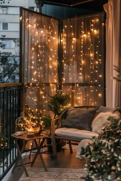 the balcony is decorated with christmas lights and greenery