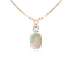 The beautiful prong-set oval opal is topped with a sparkling diamond accent. This classic and elegant pendant with V bale is crafted in 14k rose gold. 14th Wedding Anniversary, Sparkling Diamond, Elegant Pendant, Opal Pendants, Fine Jewellery Necklace, Sparkle Diamonds, Wedding Anniversary, Birthstone, Gemstone Jewelry