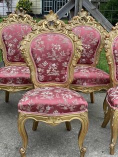 a set of four antique style chairs and footstools in red velvet with gold trim