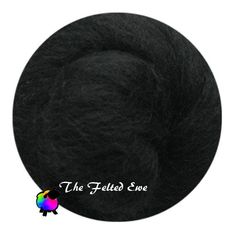 the felted edge is black and has a circular shape on it, with an inscription underneath