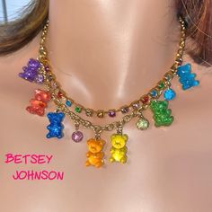 Betsey Johnson Rainbow Gummy Bear Shape Charm Necklace New In Box The gold-tone chain Necklace features rhinestone crystals & round links Multi-color resin gummy bear shaped charms  Colors: Blue, Green, Yellow, Orange, Red, Purple The adjustable necklace is 16" long with a 3" extension Lobster closure ensures a secure fit Charm Necklace Diy, Gold Rhinestone Earrings, 90s Jewelry, Bear Shape, Color Resin, Betsey Johnson Necklace, Life Vision, Candy Jewelry, Fruit Jewelry