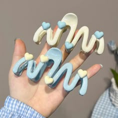 Transform Your Look with the Trendy Wavy 3D Heart Hair Clip! 🌊✨ Stylish & Modern Design ️🎨 Elevate your hair game with our Wavy Hair Clip Set, featuring a chic and unique wave pattern with 3D hearts that perfectly complements any hairstyle. These clips are not just functional; they're a fashion statement. Available in soft pastel shades of baby blue and frosted white, these clips add a touch of elegance and fun to your daily look. Whether you're dressing up for a special occasion or adding fla Aesthetic Claw Clip, Korean Hair Clip, Heart Wave, Headwear Fashion, Shark Clip, Korean Hair, Stylish Aesthetic, Hair Clamps, 3d Heart