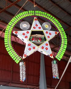 a large star decoration hanging from the ceiling