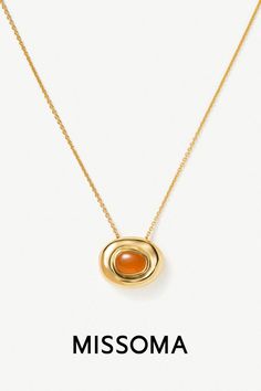 Discover layering necklaces in silver or gold. Make it molten with show-stopping sculptural shaped pendants, from the nugget and doughnut, to the bean. Our best selling styles pair molten metals with hand-cut semi-precious gemstones. The Nugget, Semi Precious Gemstones