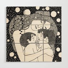 a wood block with an image of two people hugging each other and bubbles in the background