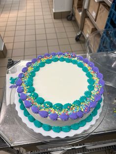 a cake sitting on top of a counter in a kitchen