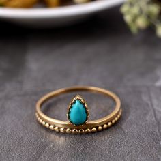 Pear shape Gemsrone croen design Turquoise ring, statement ring, Dainty ring, Handmade jewelry, boho ring, vintage ring, turquoise jewelry Enjoy Free Shipping on All Orders Product Description:- *Handmade item *Dispatches from a small business in India *Materials         :-   Brass, Silver *Band colour    :-  Gold,   Silver *Style                 :-   Boho & hippie *Can be personalized Ring Type                :-    Gemstone  Ring SIZE           :-    All Size Are Available. Choose From Variation. METAL           :-    Pure  Brass or 925 sterling silver ( Nickel  Free Ring )                              :-    All Metal Are Available. Choose From Variation. Gemstone               :-     Turquoise stone shape            ;-     pear Ring can be customized on request and gemstone can be made t Bohemian Turquoise Gemstone Ring, Elegant Handmade Gold Turquoise Ring, Handmade Gold Bohemian Turquoise Ring, Gold Adjustable Turquoise Ring, Adjustable Gold Spiritual Turquoise Ring, Turquoise Gold Ring, Brass Rings, Pear Ring, Ring Fashion