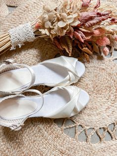 Comfortable satin wedge shoes for your bohemian wedding. These elegants boho style espadrilles are perfect for a dreamy beach or countryside style wedding.  The only bridal shoes you can actually dance in. *Wedge heel made of natural jute and rubber *Inner sole material : cotton *Cushioned/padded footbed and arch support *High quality Ivory silky satin upper fabric  *Adjustable ankle strap with buckle closure *Almond toe shaped for a sophisticated effect *Closed heel for better support *Peep toe  *Made in Spain High quality, sustainable and ecologic boho platform shoes. These bridal  ankle strap wedges sandals are the perfect mix between the confort of espadrilles and the elegance of satin peep toes thanks to the twisted upper fabric offering a flattering opening on the instep.  Upper fabr Summer Wedding Heels With Removable Insole, Summer Wedding Shoes With Low Heel And Removable Insole, Summer Wedding Shoes With Removable Insole And Low Heel, Summer Wedding Closed Toe Wedge Sandals, Spring Wedding Sandals With Wedge Heel, Spring Wedding Wedge Heel Sandals, Spring Beach Wedding Shoes With Round Toe, Spring Wedding Open Toe Wedge Sandals, Cream Open Toe Wedding Shoes For Summer