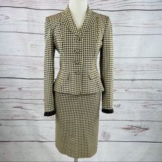 Kay Unger Houndstooth Skirt Suit. 100 % Silk Shell In Brown And Cream Houndstooth Pattern. Pencil-Style Skirt. The Material Does Not Have Stretch. Jacket- Mild Discoloration On The Interior Armpits, Fully Lined, Shoulder Pads, Fake Front Pockets, Ribbon Accent At Cuffs. Flat Measurements- Armpit To Armpit 18", Waist 15", Shoulder To Hem 21" Shoulder To Cuff, Rear Shoulder Seam To Seam 15" Skirt- Pencil Style With Rear Kick Pleat, Fully Lined, Rear Zipper With A Hook. Flat Measurements- Waist 12", Hips 19", Length 22.5" Suit Brown, Kay Unger, Skirt Pencil, Houndstooth Skirt, Kick Pleat, Houndstooth Pattern, Style Skirt, Skirt Suit, Skirt Fashion