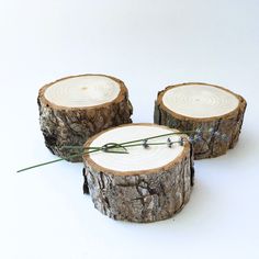 three pieces of wood with flowers on them