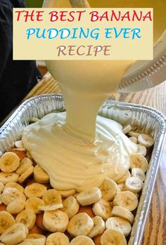 a pan filled with bananas and cream being drizzled on top of it