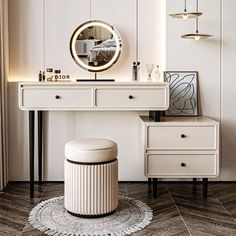 a white dressing table with a mirror and stool next to it on top of a wooden floor