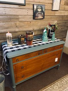 an old dresser is decorated with christmas decorations