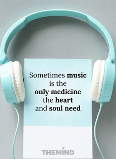 headphones with a sign that says sometimes music is the only medicine the heart and soul need