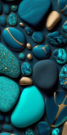 blue and gold rocks are arranged together