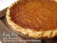 a pie sitting on top of a wooden table