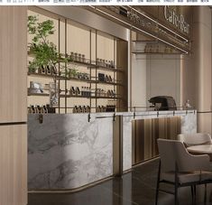 the interior of a restaurant with marble counter tops and chairs, along with shelves filled with bottles