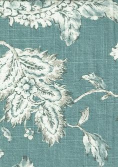 a blue and white floral pattern on fabric