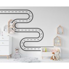 a child's room with white walls and black lines on the wall