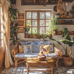 a living room filled with lots of plants next to a window covered in wicker