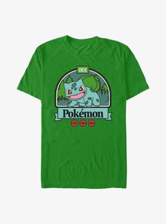 a green pokemon t - shirt with an image of a cartoon character on the front