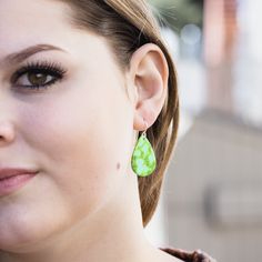 These handcrafted, Sonoran Green Upcycled Earrings make the perfect accessory for a pop of color. Crafted from discarded pieces of sonoran green turquoise, our upcycled styles ensure we use every last bit of turquoise in our jewelry. Add a touch of bohemian to your look with these beautiful earrings. No two pairs are alike! Upcycled Sonoran Green Turquoise Earrings Sterling Silver Hooks Small: 1 1/4" long, 5/8" wide Medium: 1 1/2" long, 7/8" wide Large: 1 3/4" long, 1" wide Upcycled Earrings, Gallery Jewelry, Stacked Jewelry, Men's Jewelry Rings, Green Earrings, Large Earrings, Green Turquoise, Earrings Sterling Silver, Turquoise Earrings