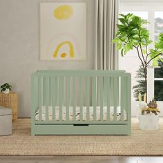 a baby's room with a green crib in the corner