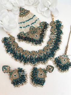 Elegant Pakistani bridal set with Jhoomer/Pakistani Jewelry/ Indian and Pakistani wedding jewelry/ Bollywood jewelry/ kundan and Polki jewelry/morepankhia/Rama green/peacock green  This elegant necklace set comes with Earrings, tikka and Jhoomer/Passa. All items are shipped from Brampton, Ontario, Canada. If you need your item by a certain day, please reach out to us for express delivery option before placing the order so that we can update the shipping for you. Standard shipping/delivery timeline Below are the delivery timeline estimates. We dispatch all orders by the next business day. ---> USA delivery timeline * 3-6 business days to major urban centers in USA. It may take 1-2 days extra to remote locations ---> Canada delivery timeline  * 2-3 business days - GTA  & Montreal  * 2-4  bus Pakistani Wedding Jewelry, Pakistani Necklace, Kundan Polki Necklace, Brampton Ontario, Bridal Jewellery Inspiration, Jewelry Kundan, Green Peacock, Necklace Set Indian, Gold Bridal Jewellery Sets