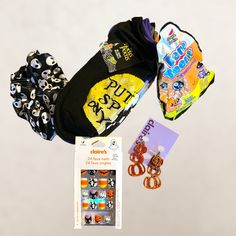 Great Little Bundle For The Spooky Lover In Your Life. It Includes A 5-Pack Ankle Socks Featuring Disney's Hocus Pocus. Adorable Press On Nails With Black Cats, Ghosts & Candy Corn. Adorable Sparkly Dangle Pumpkin Earrings, An Alien Hair Scrunchie And A Mystery Claire's Exclusive Plushie! Hocus Pocus Book Earrings, Hocus Pocus Earring, Sanderson Sisters Earrings, Alien Hair, Hocus Pocus Loungefly, Halloween Fuzzy Socks, Nails With Black, Halloween Novelty Jewelry With Charms, Claire's Accessories