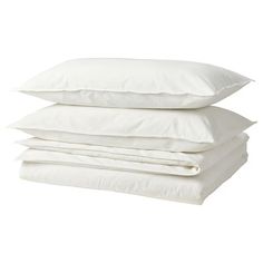 three pillows stacked on top of each other