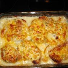 a casserole dish with cheese and meat in it