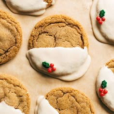 cookies decorated with white icing and holly leaves