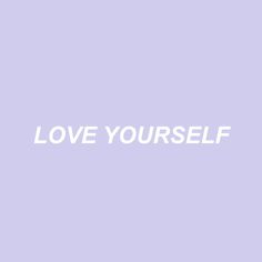 the words love yourself written in white on a pink background