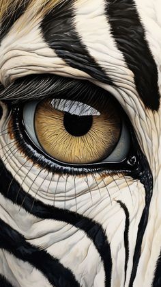 an animal's eye is shown with black and white stripes on the iris part of its face