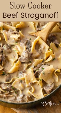 a skillet filled with pasta and meat in a creamy sauce that is ready to be eaten