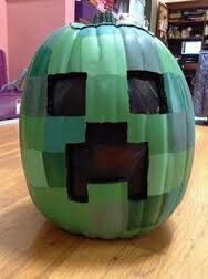 a large green pumpkin sitting on top of a wooden table