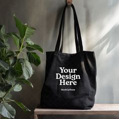 Instantly enhance your online store with our high-quality digital download of this blank tote bag mockup image! Perfect for showcasing your unique designs and artwork. By using our mockups, you can easily place your artwork on the bag and create a stunning visual representation of your products. ⚡ INSTANT DOWNLOAD: Your JPG file at size 2000px x 2000px is instantly downloaded after your payment has cleared with Etsy. No physical product will be sent to you. No refund on digital products. More information about Etsy downloads can be found here: https://www.etsy.com/help/article/3949 If you have trouble using this file, please contact me - I'm happy to help! ⚡ TERMS OF USE: You are allowed to use this product for personal and commercial use. You cannot resell this digital file. By utilising Customizable Eco-friendly Black Bags, Customizable Black Rectangular Bag, Black Tote Bag For Personal Use, Customizable Black Canvas Bag For Daily Use, Customizable Black Canvas Bag For Everyday Use, Customizable Black Everyday Bags, Customizable Black Rectangular Canvas Bag, Customizable Black Tote Bag, Customizable Black Bag For Daily Use