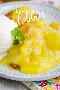 lemon cobbler on a plate with ice cream