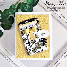 a close up of a card with flowers on it