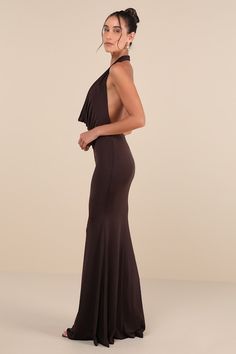 Everyone's attention will be on you and the way you move in the Lulus Eye-Catching Silhouette Dark Brown Cowl Neck Halter Maxi Dress! Slinky, stretchy jersey knit shapes this jaw-dropping dress with a halter neckline and a plunging cowl bodice. The figure-flattering silhouette falls to a mermaid skirt with an elegant maxi hem. Dual, covered top button closures secure atop the sexy open back design. Elastic at back for fit. Fit: This garment fits true to size. Length: Floor length. Size medium me Brown Wedding Guest Dress, Dropping Dress, Halter Maxi Dress, Halter Maxi, Knit Cowl, Mermaid Skirt, Halter Maxi Dresses, A Mermaid, Guest Outfit