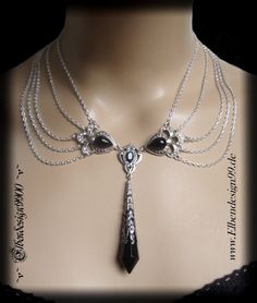 A very noble gothic style choker, which, like all my jewelry, was made with great care and attention to detail. The necklace was made from silver-plated metal ornaments with black faceted glass beads & black drop-shaped glass gemstones. In addition, clear rhinestones were used. The chain is adjustable from approx. 40 cm-48 cm, single piece Vampire Necklace, Butterfly Fashion, Witch Necklace, Dark Jewelry, Metal Ornaments, Choker Black, Gothic Chokers, Necklace Gothic, Gothic Gifts