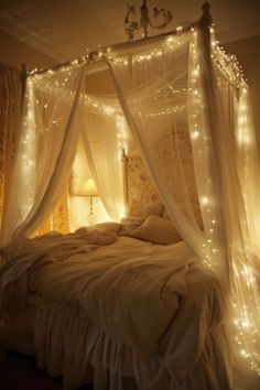 a canopy bed with lights on it in a bedroom